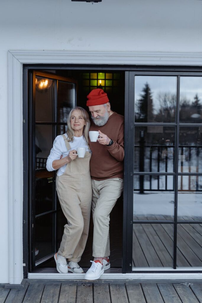 Couple Standing by the Door