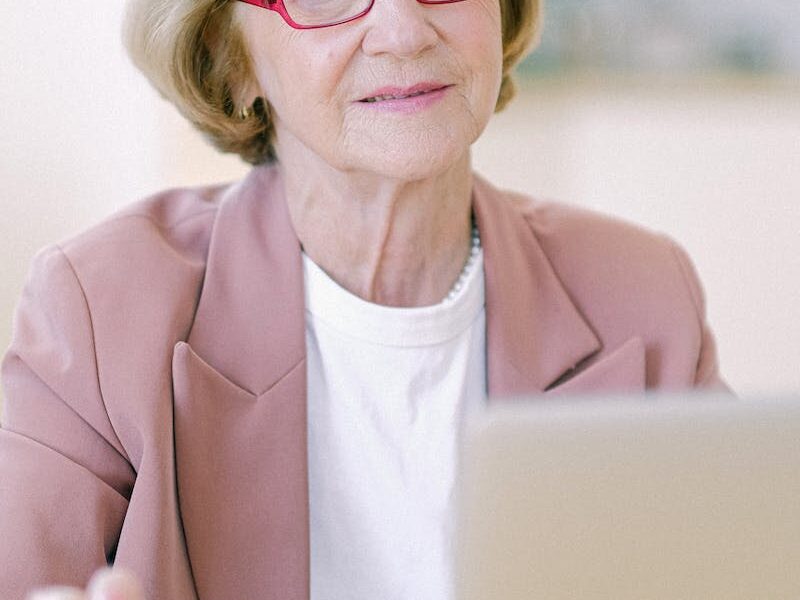 elderly women at work on computer