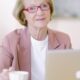 elderly women at work on computer