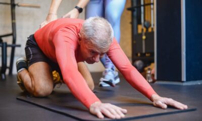 Elderly Man Stretching His Body