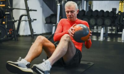 Elderly Man Working Out at the Gym bodybuilding