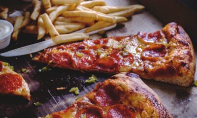 baked pepperoni pizza with French fries